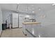 Functional community kitchen with essential appliances, ample counter space, and neutral color scheme at 4540 Overlook Ne Dr # 246, St Petersburg, FL 33703