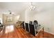 Open dining room and living space with hardwood floors at 4668 66Th N Pl, Pinellas Park, FL 33781