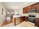 Bright kitchen with stainless steel appliances and opens to the living area, perfect for entertaining at 4668 66Th N Pl, Pinellas Park, FL 33781