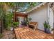 Large deck featuring outdoor seating and lovely plants, offering a great space for entertaining at 5101 N Suwanee Ave, Tampa, FL 33603