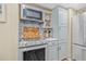 Gourmet kitchen featuring modern appliances and ample cabinet space at 5101 N Suwanee Ave, Tampa, FL 33603