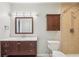 Updated bathroom with tiled shower, vanity, and framed mirror at 5203 Oak Charter Ct # 5203, Temple Terrace, FL 33617