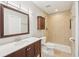 Updated bathroom with tiled shower, vanity, and framed mirror at 5203 Oak Charter Ct # 5203, Temple Terrace, FL 33617