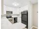 Well-equipped kitchen with a breakfast bar at 5203 Oak Charter Ct # 5203, Temple Terrace, FL 33617