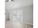 Sunlit living room featuring new floors and a large bay window at 5203 Oak Charter Ct # 5203, Temple Terrace, FL 33617