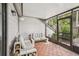 Cozy screened patio with comfortable seating, perfect for relaxation and enjoying the outdoors at 5203 Oak Charter Ct # 5203, Temple Terrace, FL 33617