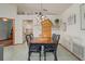 Inviting dining room boasts unique decor, creating a perfect space for Gathering meals and gatherings at 5301 Bayonne Ave, Spring Hill, FL 34608