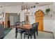 Inviting dining room boasts unique decor, creating a perfect space for Gathering meals and gatherings at 5301 Bayonne Ave, Spring Hill, FL 34608