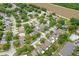 Scenic aerial view of a neighborhood with lush trees and well-maintained homes at 547 Summer Sails Dr, Valrico, FL 33594