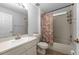Bright bathroom with a shower-tub combo and a neutral-toned shower curtain at 547 Summer Sails Dr, Valrico, FL 33594