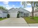 Charming single-story home with a well-maintained front yard and attached garage at 547 Summer Sails Dr, Valrico, FL 33594