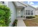 Inviting front porch with landscaping, perfect for enjoying the outdoors at 547 Summer Sails Dr, Valrico, FL 33594