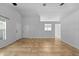 Bright, expansive living room with light tile floors, and multiple large windows at 547 Summer Sails Dr, Valrico, FL 33594