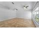 Spacious living room with tile floors, windows and ceiling fans at 547 Summer Sails Dr, Valrico, FL 33594