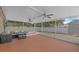 Spacious screened patio with fan, table and chairs for outdoor lounging or entertaining at 547 Summer Sails Dr, Valrico, FL 33594