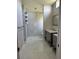 Spacious bathroom with walk-in shower, updated vanity, and bright natural light for a clean aesthetic at 5494 Sabal Trace Dr, North Port, FL 34287