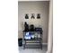 Coffee bar setup with coffee maker, decorations and organization on the shelves at 5494 Sabal Trace Dr, North Port, FL 34287