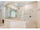 This bathroom includes a walk-in shower at 611 1St S Ave, Tierra Verde, FL 33715