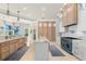 Spacious kitchen with island, marble counters, custom cabinets, and ocean views at 611 1St S Ave, Tierra Verde, FL 33715