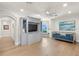 This is a spacious living room with built-in shelves at 611 1St S Ave, Tierra Verde, FL 33715