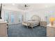This main bedroom offers bright natural light and beautiful views of the outside at 611 1St S Ave, Tierra Verde, FL 33715