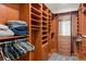 This walk-in closet has plenty of built-in storage at 611 1St S Ave, Tierra Verde, FL 33715
