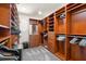 This walk-in closet has plenty of built-in storage space at 611 1St S Ave, Tierra Verde, FL 33715