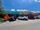 Street view with Casa Tina and other local businesses on a sunny day at 702 Lyndhurst St # 822, Dunedin, FL 34698