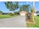 Charming single-story home with a well-manicured lawn, and spacious driveway at 7400 Locust Ne St, St Petersburg, FL 33702