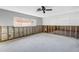 Large, bright space with window and concrete flooring, ready for customization at 7400 Locust Ne St, St Petersburg, FL 33702