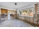 Room under renovation featuring a large window, showcasing renovation potential at 7400 Locust Ne St, St Petersburg, FL 33702