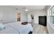 Spacious bedroom with hardwood floors and views through to the other rooms at 805 Leisey Cir, Ruskin, FL 33570