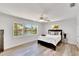 Cozy bedroom with a large window featuring stunning water views and natural light at 805 Leisey Cir, Ruskin, FL 33570