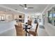 Open dining area with table, chairs, and a spacious view to the living room at 805 Leisey Cir, Ruskin, FL 33570