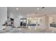 Modern kitchen features stainless steel appliances, a marble countertop, and white cabinetry at 805 Leisey Cir, Ruskin, FL 33570