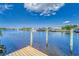View of the waterway from a wooden dock, featuring boat access and serene water views at 805 Leisey Cir, Ruskin, FL 33570