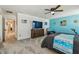 Spacious bedroom with modern decor, ample natural light, and stylish furnishings for a peaceful retreat at 8148 Artisan Cir, Seminole, FL 33777