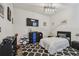Cozy bedroom with neutral walls, modern rug, and a well-lit ambiance at 8148 Artisan Cir, Seminole, FL 33777
