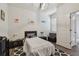 Comfortable bedroom showcasing a cozy bed, natural light, and minimalist decor at 8148 Artisan Cir, Seminole, FL 33777