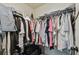 A walk-in closet featuring ample hanging space and storage solutions at 8148 Artisan Cir, Seminole, FL 33777