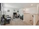 Comfortable living room features neutral colors, plush seating, and a cozy atmosphere perfect for relaxation and entertainment at 8148 Artisan Cir, Seminole, FL 33777