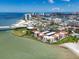 Waterfront condo with manicured landscaping, convenient parking, community pool, and beautiful water views at 825 S Gulfview Blvd # 104, Clearwater Beach, FL 33767