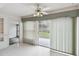Bright living space with sliding glass doors leading to the outdoors at 8319 Annwood Rd, Seminole, FL 33777