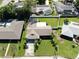 Aerial view showing the property with well-maintained lawns and mature trees at 8671 11Th N St, St Petersburg, FL 33702