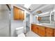 Bathroom featuring a shower and a cabinet at 8671 11Th N St, St Petersburg, FL 33702