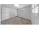 Bedroom with a closet and carpet at 8671 11Th N St, St Petersburg, FL 33702