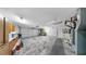 Spacious garage with ample storage cabinets and a clean, well-lit interior at 8671 11Th N St, St Petersburg, FL 33702