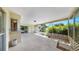 Screened patio with an outdoor view and sliding glass door access at 8671 11Th N St, St Petersburg, FL 33702