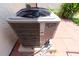 Exterior shot of the AC Unit on a brick patio at 9209 Seminole Blvd # 13, Seminole, FL 33772