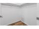 A small walk-in closet with shelving and a rod for hanging clothes at 9209 Seminole Blvd # 13, Seminole, FL 33772